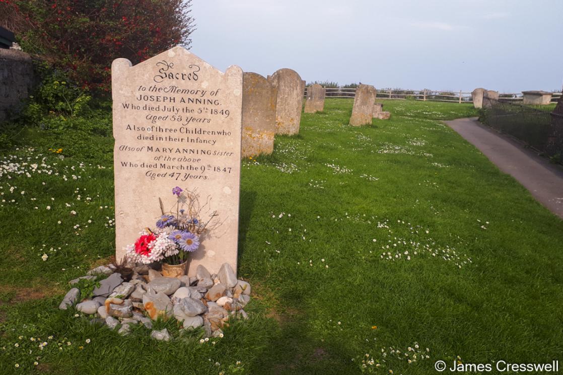 A photograph of the grave of Mary Anning in Lyme Regis, taken on a GeoWorld Travel geology and fossil tour, trip and holiday