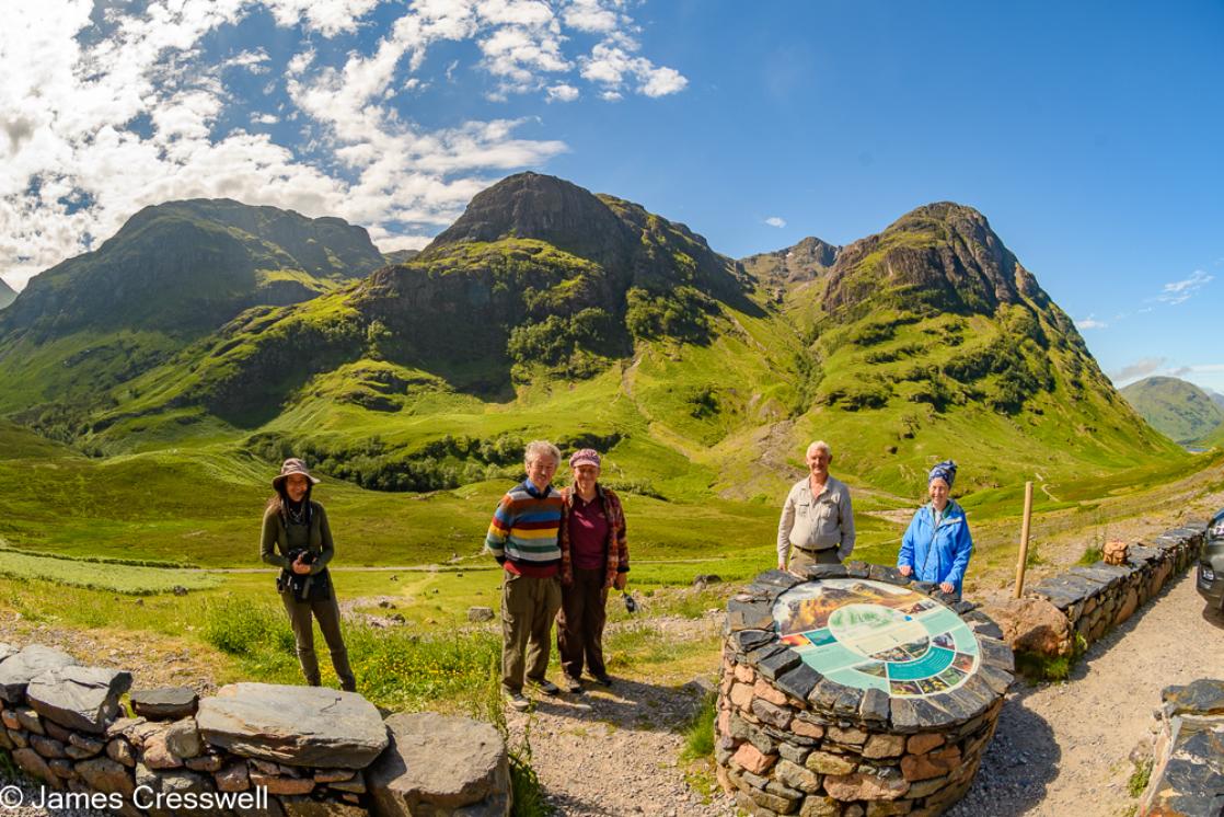 Five people stand socially distanced in Glencoe