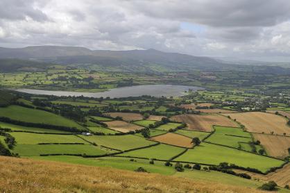 Llangorse Lake as seen from Cockitt Hill was formed in the last Ice Age, GeoWorld Travel geology field trip