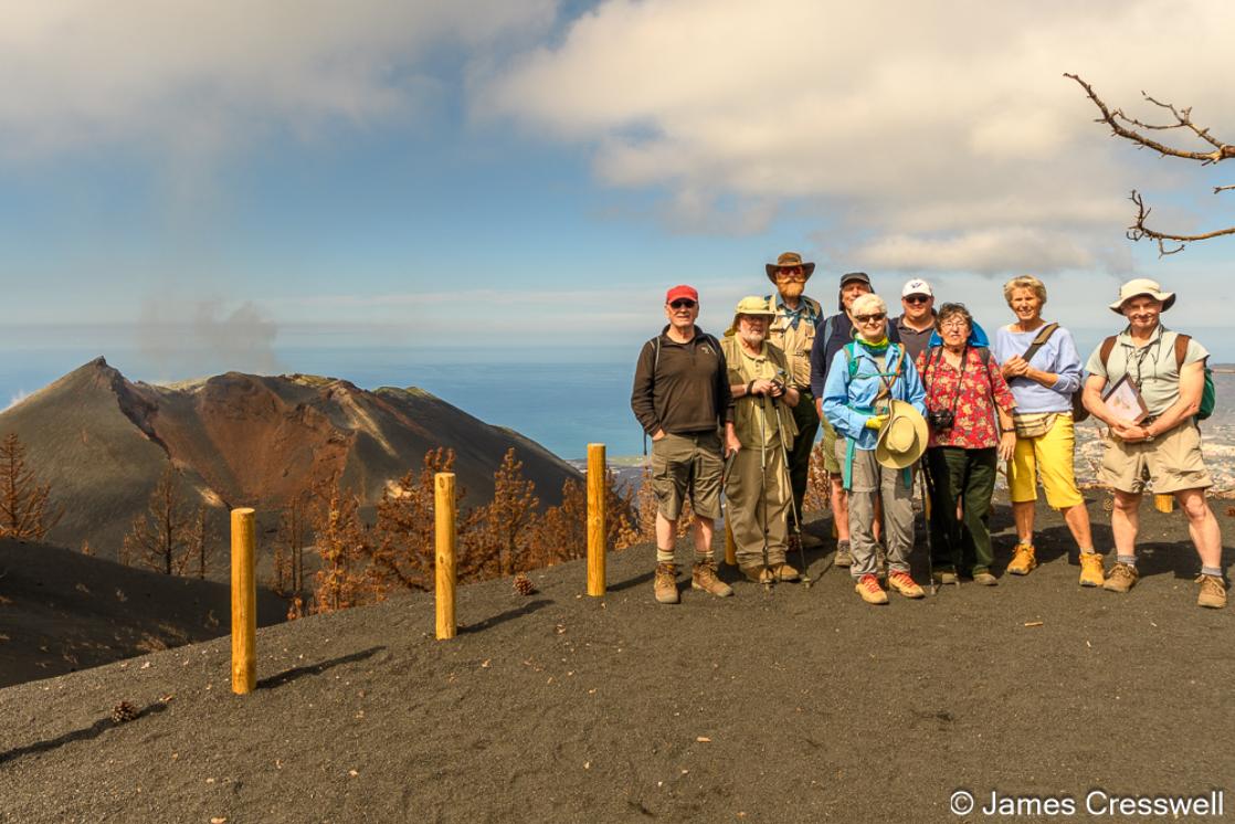 A photo of a GeoWorld Travel group at Tajogaite volcano, La Palma